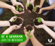 hands holding a seedling and dirt