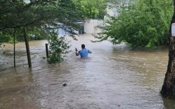 man-in-floodwaters-jan-2023