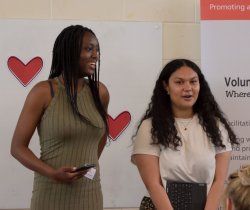 Joshlyn on the left and Dremayer on the right performing their spoken word poem